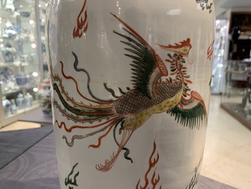 A Chinese famille verte inscribed 'dragon and phoenix' rouleau vase, Kangxi mark and of the period